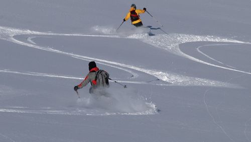 People skiing in snow