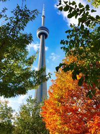 Low angle view of communications tower against sky