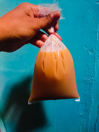 Midsection of person holding ice cream