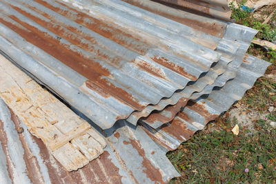 High angle view of wood stack on field