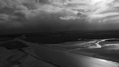 Scenic view of sea against sky during winter