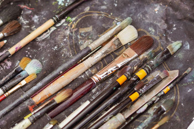 High angle view of paintbrushes in container