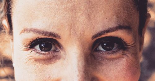 Close-up of woman looking at camera