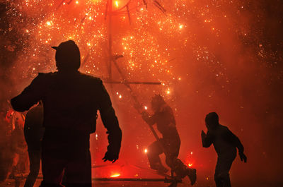 Group of people watching fire crackers