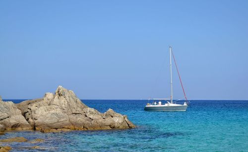 People travelling in sailboat