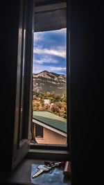 Cityscape seen through window