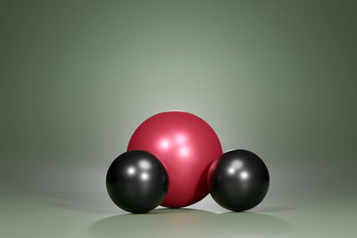 Close-up of multi colored ball on table