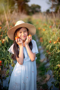 Full length of a girl wearing hat