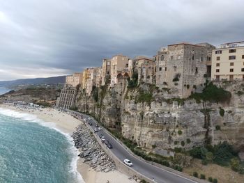 Panoramic view of beach against cloudy sky