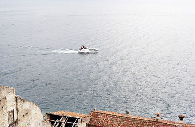 High angle view of ship sailing on sea