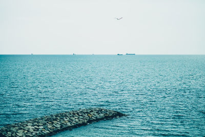 Scenic view of sea against clear sky