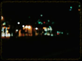 High angle view of illuminated road at night