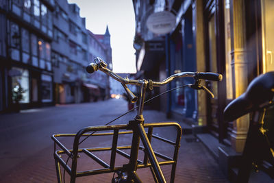 Close-up of bicycle parked on street