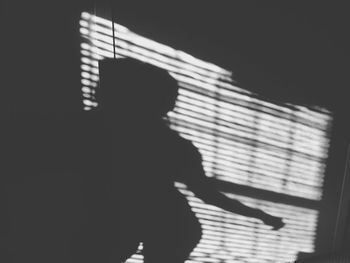 Shadow of people on tunnel