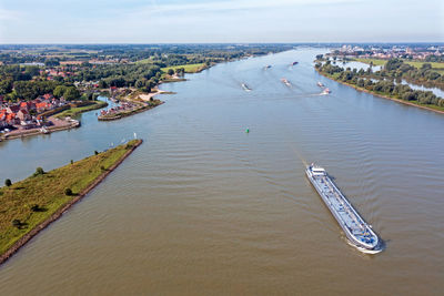 Aerial from shipping on the river merwede near gorinchem in the netherlands