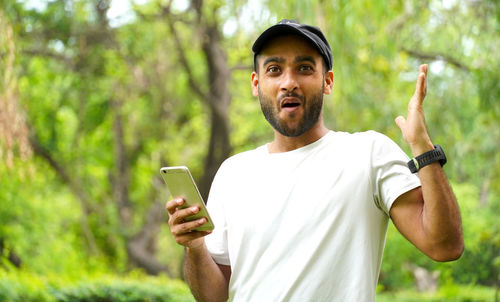 Young man using mobile phone