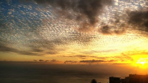 Scenic view of dramatic sky during sunset