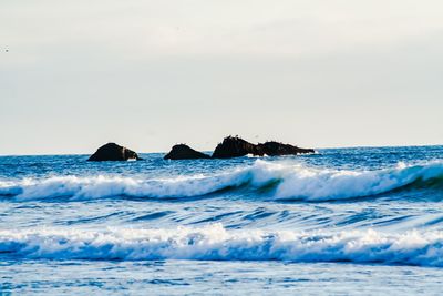 Scenic view of sea against clear sky