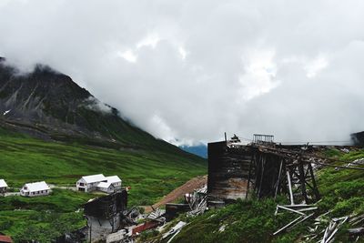 Panoramic view of buildings and mountains against sky