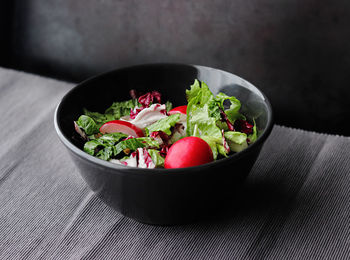 Close-up of salad in bowl on table