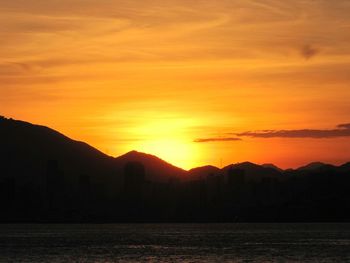 Scenic view of mountains at sunset