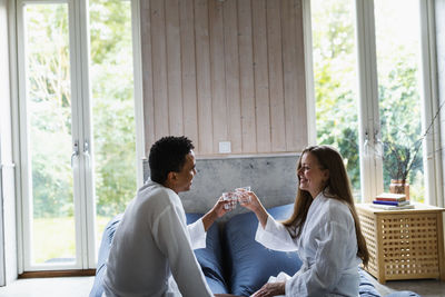 Couple relaxing together in living room