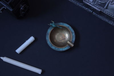 High angle view of cigarette on table