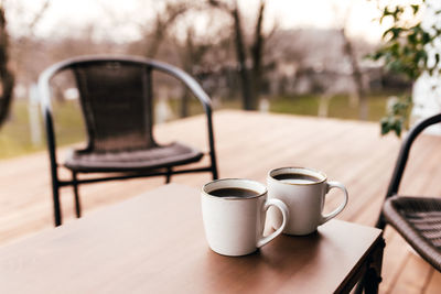 Coffee cup on table in cafe