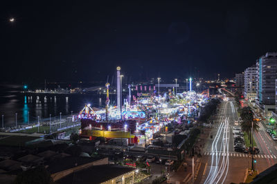 High angle view of illuminated city at night