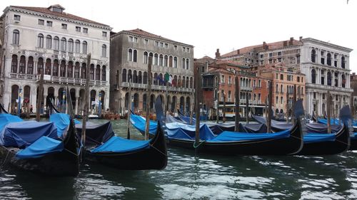 Boats moored in canal