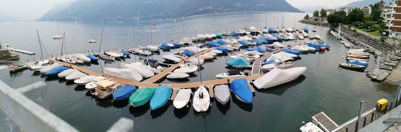 High angle view of boats moored at harbor