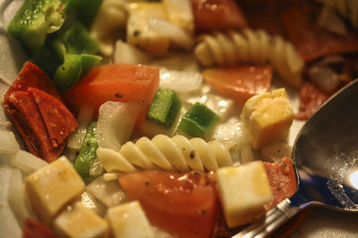 Close-up of chopped fruits in plate