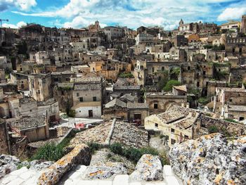 Aerial view of cityscape against sky