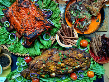 High angle view of various indian dishes on table