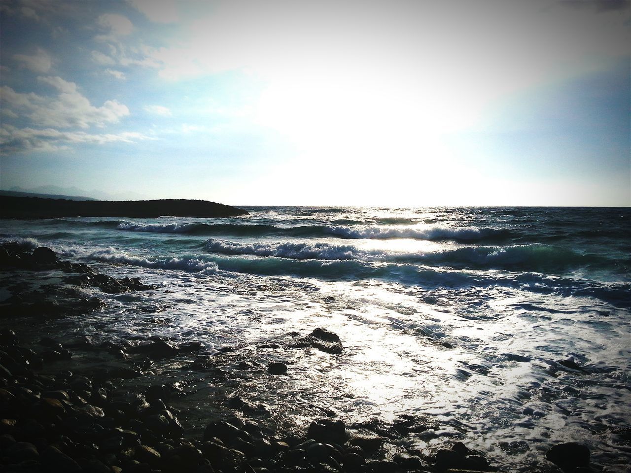 sea, horizon over water, water, beach, scenics, sky, tranquil scene, tranquility, beauty in nature, shore, nature, wave, idyllic, seascape, reflection, sunlight, outdoors, remote, cloud - sky, coastline