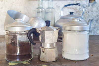 Close-up of coffee maker on table