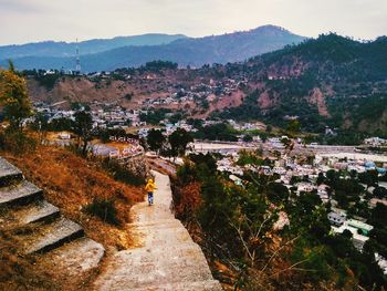 High angle view of river amidst landscape against sky