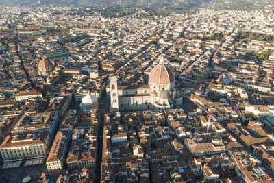 Aerial view of florence along the arno river and the old town from above, tuscany, italy,