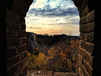 View of old ruin building against cloudy sky