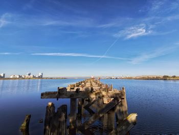 Panoramic view of sea against blue sky