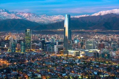 View of providencia and las condes districts in front of los andes mountain range, santiago de chile