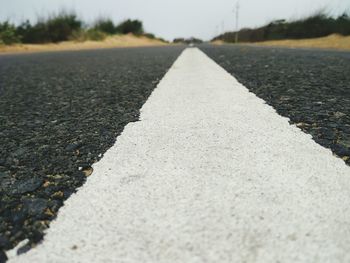 Surface level of road against sky