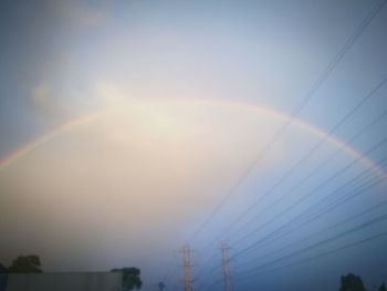Low angle view of rainbow against sky
