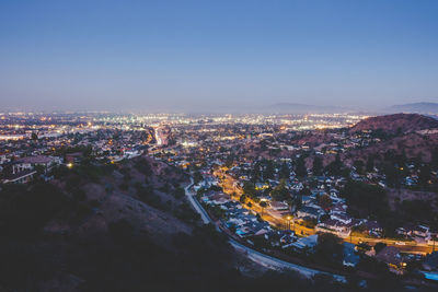 High angle view of illuminated city at night