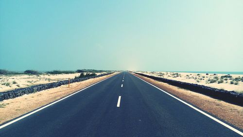 Road against clear sky