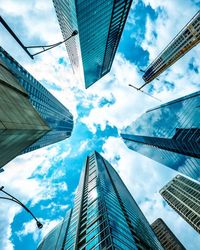 Low angle view of modern buildings against sky