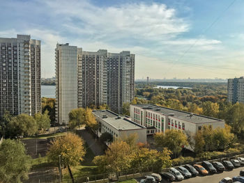 High angle view of buildings in city against sky