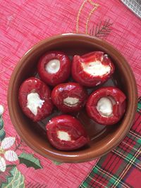 High angle view of strawberries in bowl on table