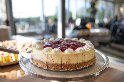 Close-up of cake with ice cream on table