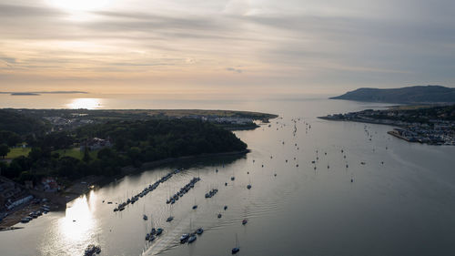 High angle view of beach against sky during sunset